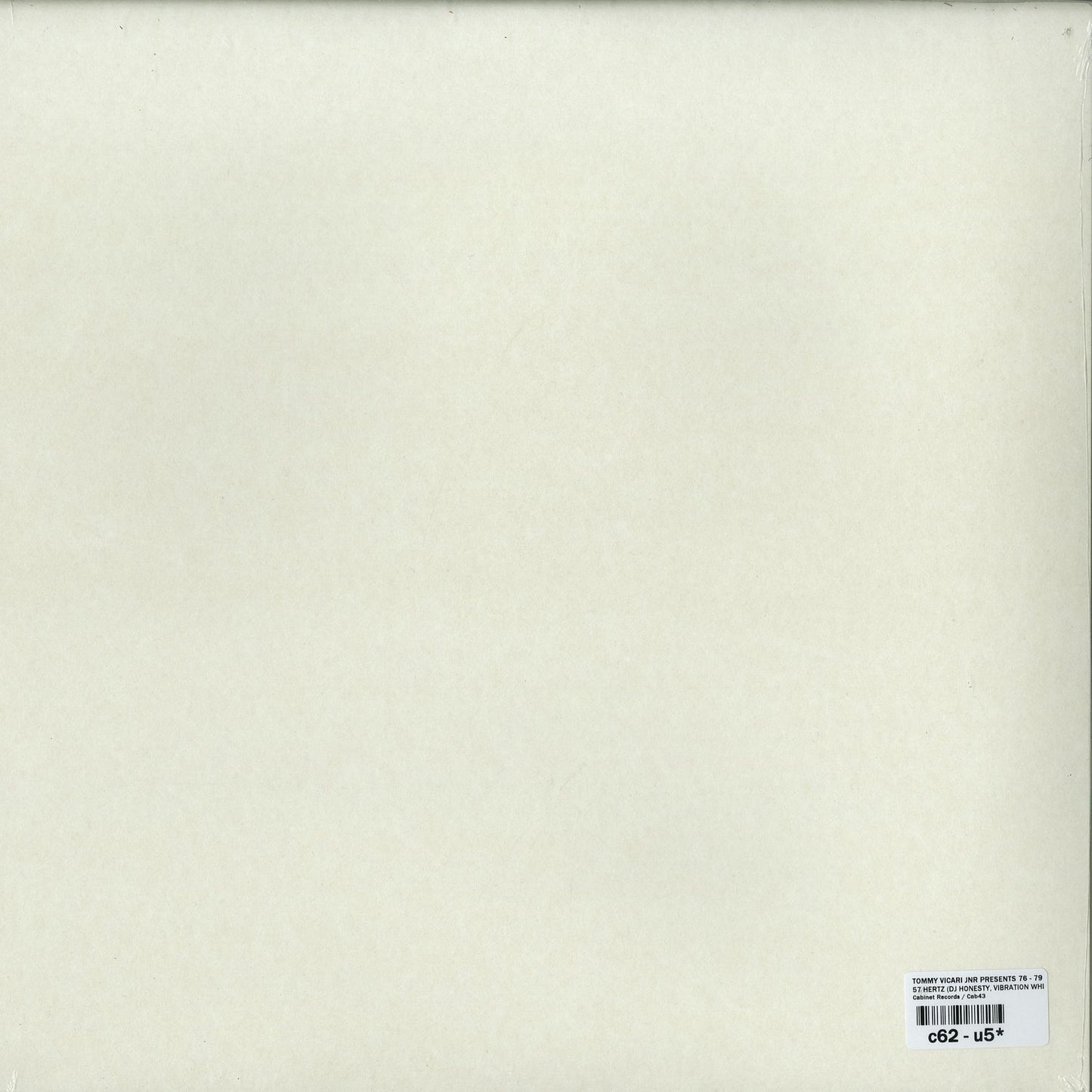 Back of second hand vinyl record "Tommy Vicari Jnr Presents 76 79 – 57 Hertz" with album details and record label visible.