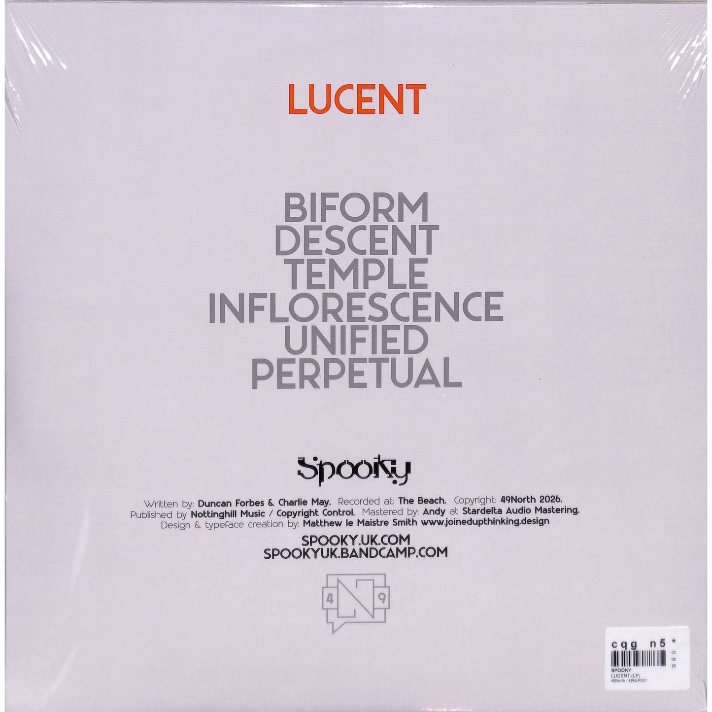 Rubadub Spooky – Lucent vinyl record with colorful album art and textured surface, showcasing its unique spooky-themed design.