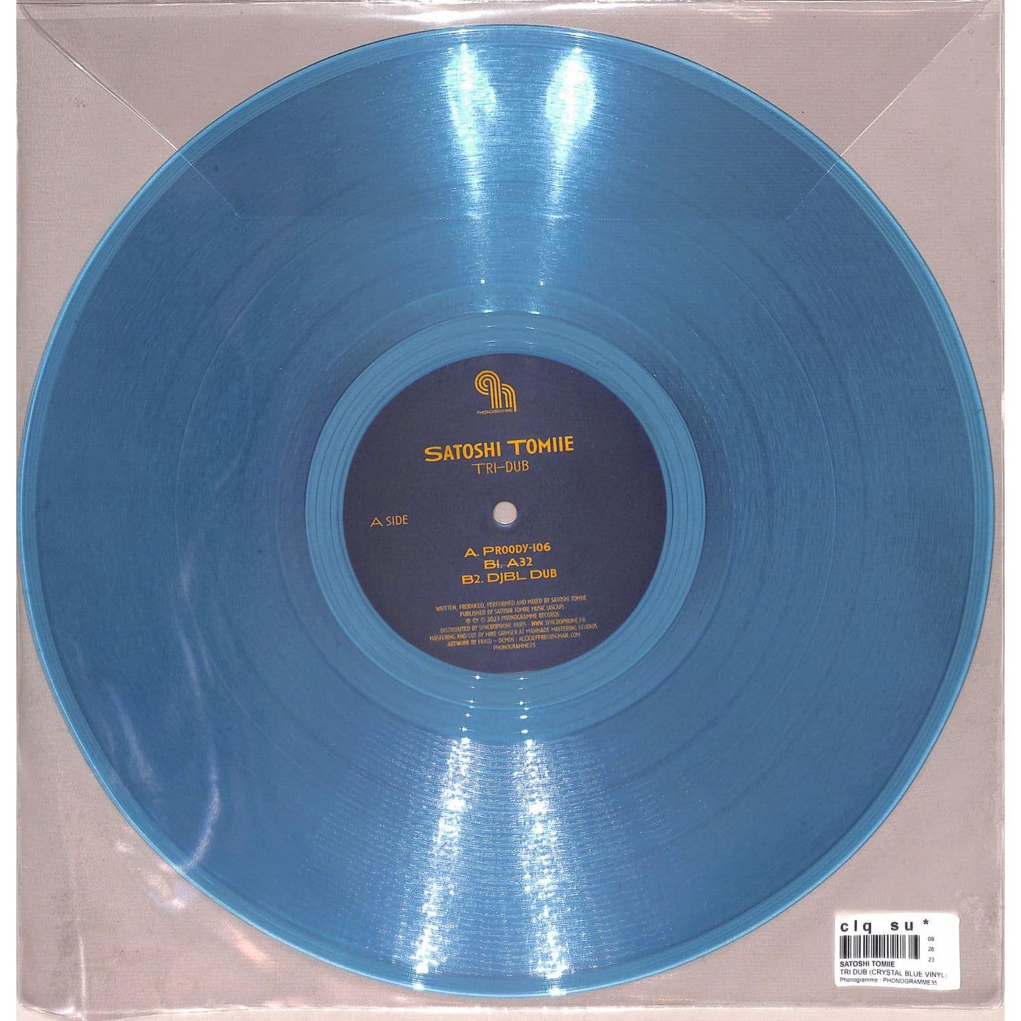 Back of Satoshi Tomiie Tri-Dub vinyl record by Syncrophone, featuring the album artwork on a black background.