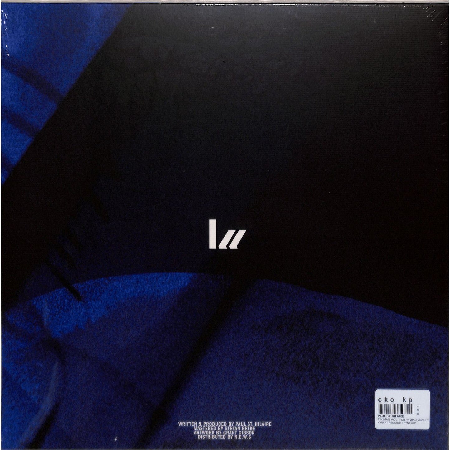 Back of vinyl record by Paul St. Hilaire, Tikiman Vol. 1, showing the black record with label details.