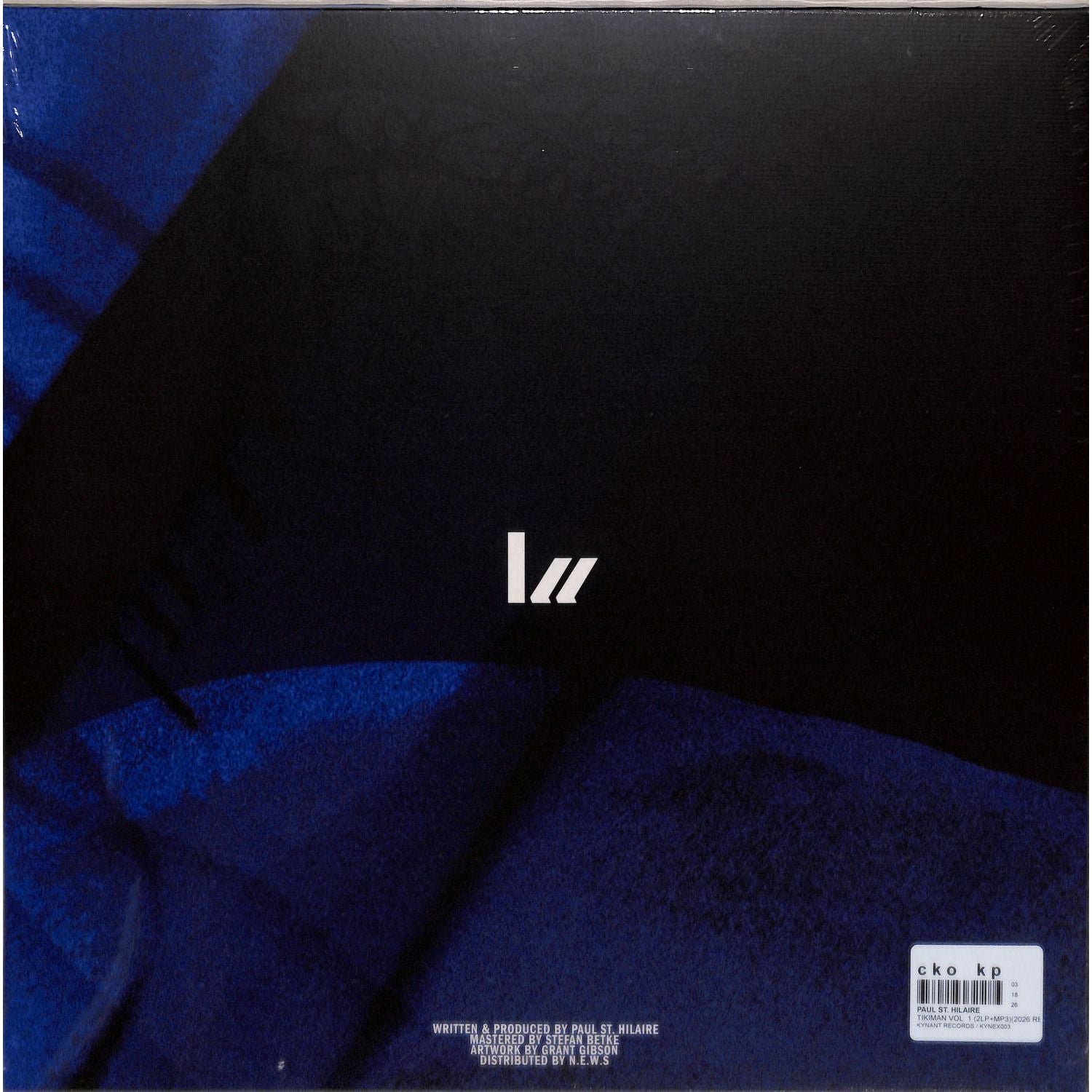 Back of vinyl record by Paul St. Hilaire, Tikiman Vol. 1, showing the black record with label details.