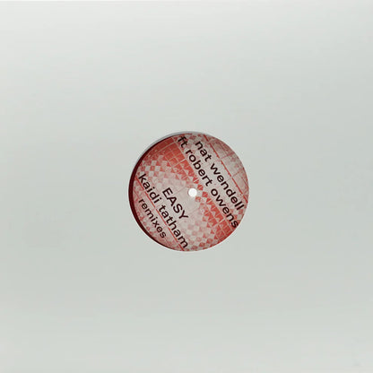 Decks vinyl record of NAT WENDELL FT. ROBERT OWENS – EASY in colored vinyl, showing the record's vibrant design and label.