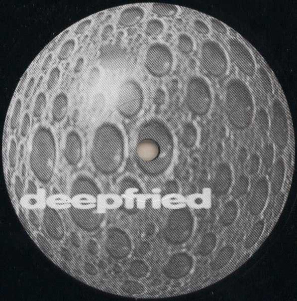 Back of Second Hand Juneau Cesium 800 vinyl record showing label and grooves, with a minimalist design on the black vinyl surface.