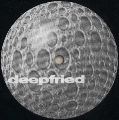 Back of Second Hand Juneau Cesium 800 vinyl record showing label and grooves, with a minimalist design on the black vinyl surface.