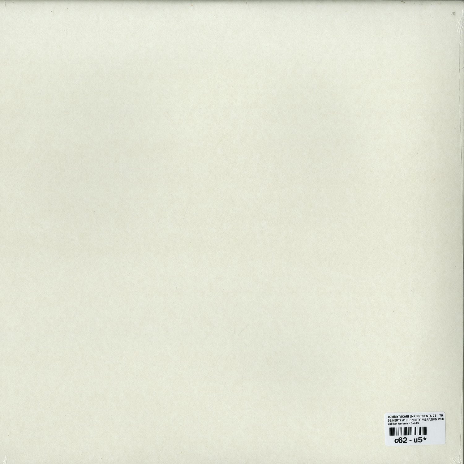 Back of second hand vinyl record "Tommy Vicari Jnr Presents 76 79 – 57 Hertz" with album details and record label visible.