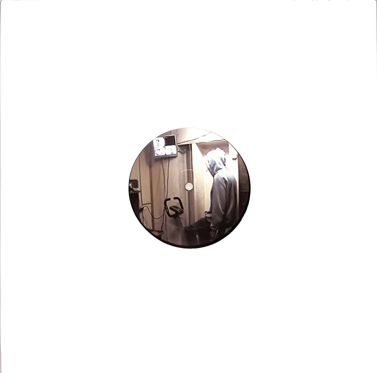 Triple Vision KASSIR vinyl record in brown and white color, showcasing the record's textured surface and label design.