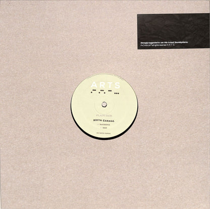 Second Hand KEITH CARNAL aluminium vinyl record with black and silver label, shown from the back side.