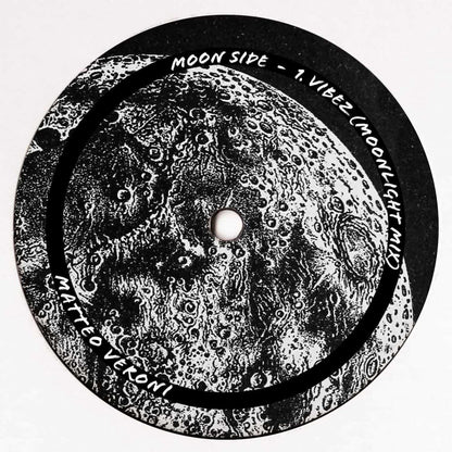 Decks Matteo Veroni VibeZ vinyl record with colorful album cover art, showcasing the back side of the music album.