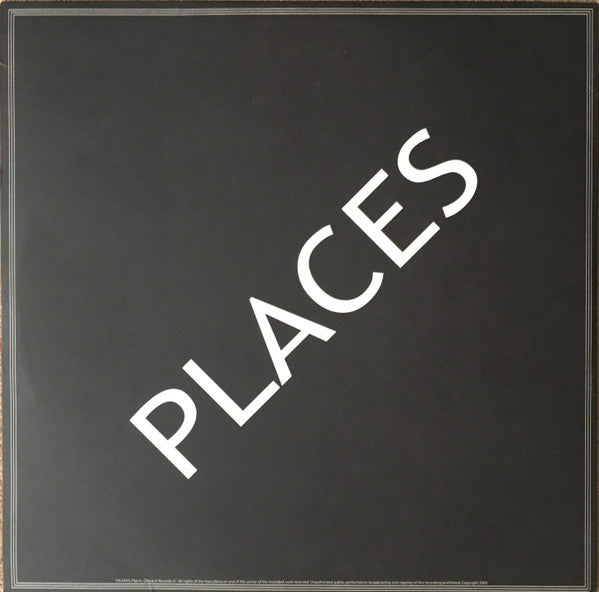 Back of Second Hand TIN MAN – PLACES vinyl record with artwork and track information visible.