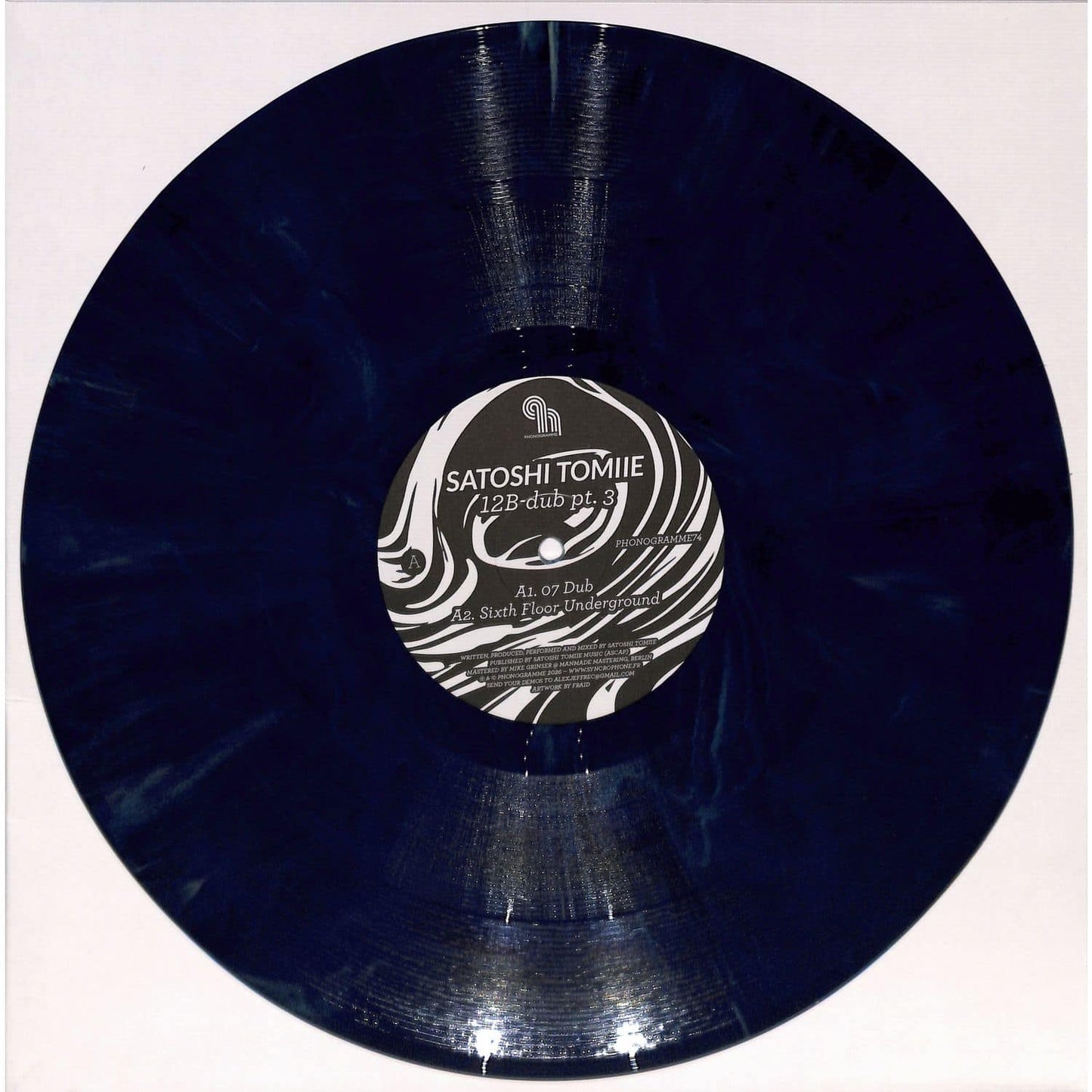 Vinyl record titled "SATOSHI TOMIIE – 12B-DUB PT. 3" featuring abstract artwork on the front cover, by Rubadub.