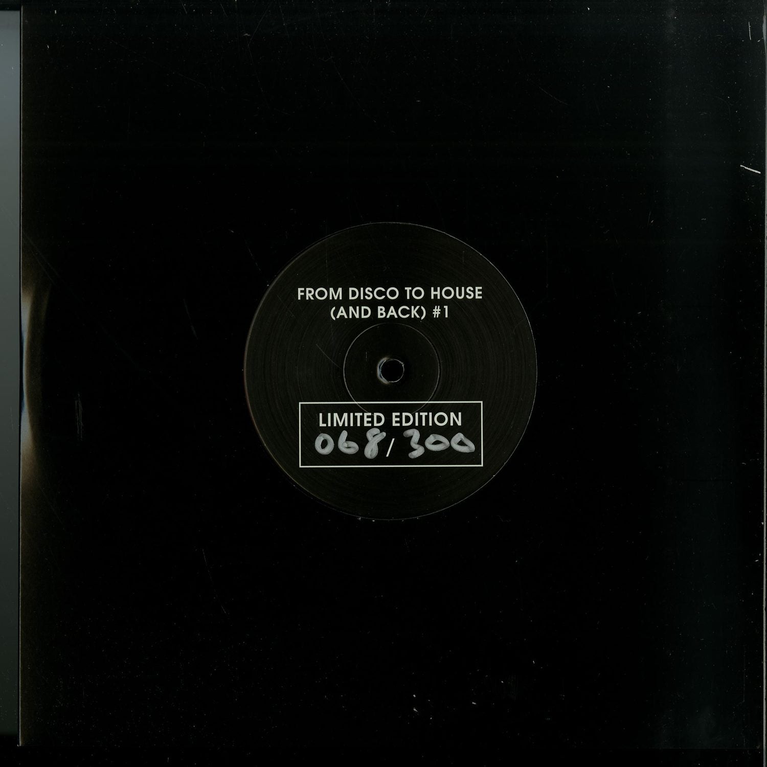Decks vinyl record titled "From Disco to House (and Back) Vol 1" featuring various artists, with colorful album cover artwork.