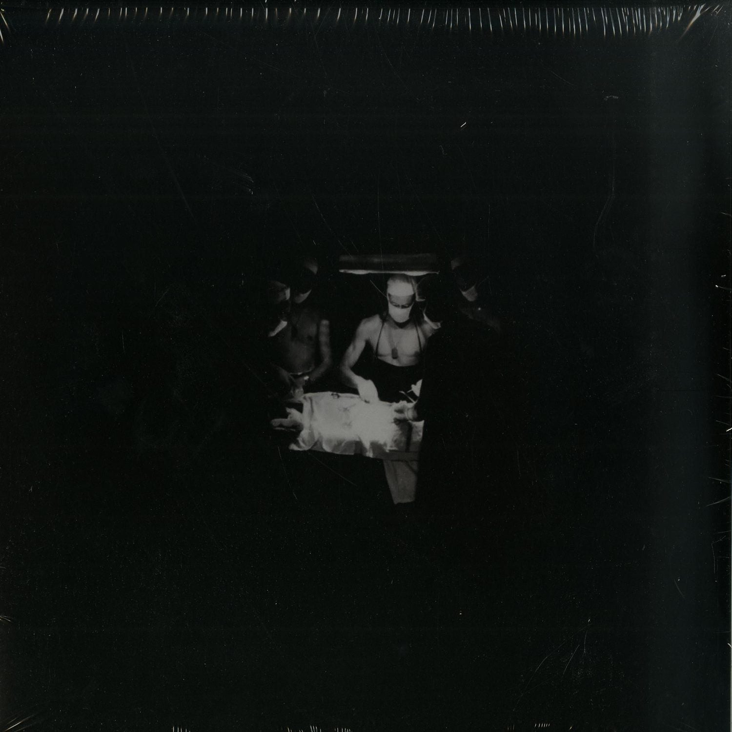 Second Hand vinyl record titled "Suspended in Gaffa" by Basic House featuring bronze teeth design on the cover artwork.