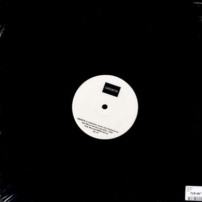 Second Hand vinyl record of Jeff Mills' "Growth" featuring the front cover artwork.