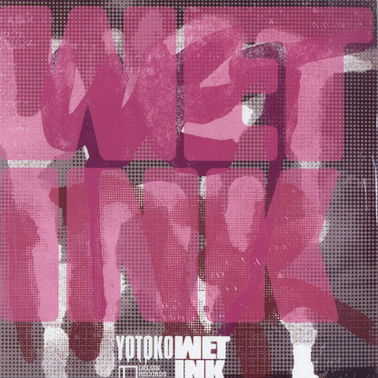 Second Hand YOTOKO Wet Ink vinyl record with colorful album cover art and printed details in a close-up shot.