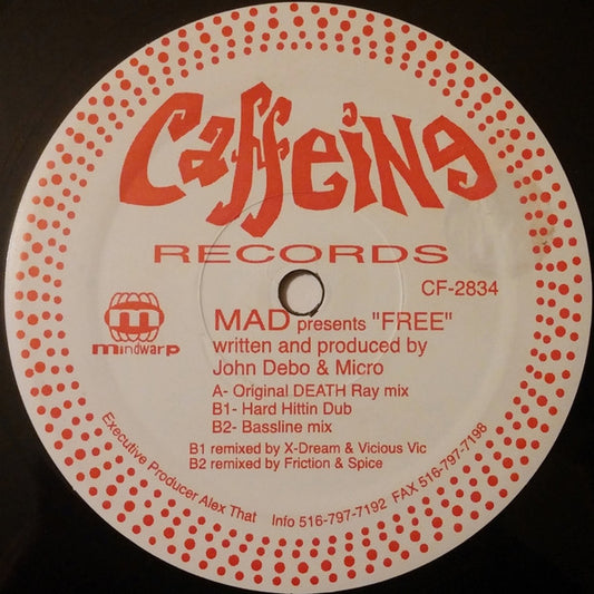 Second Hand vinyl record titled "M.A.D., X-DREAM, VICIOUS VIC, FRICTION, SPICE – FREE" with colorful album cover art.
