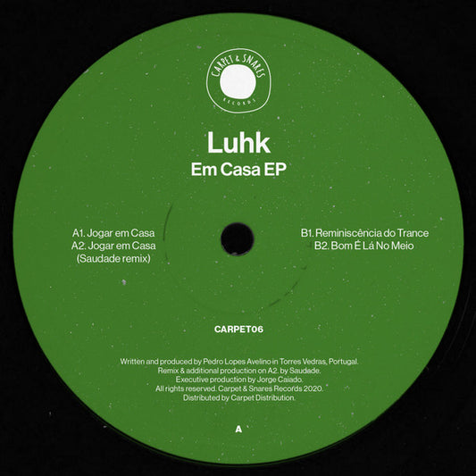 LUHK, SAUDADE – EM CASA EP vinyl record featuring colorful artwork and classic design elements.