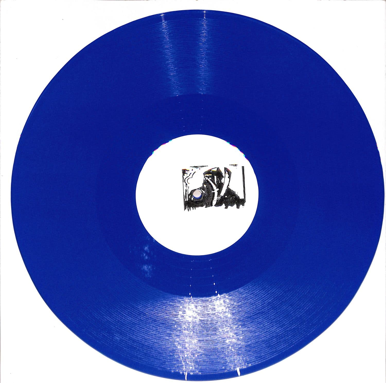 Decks IMRAN MARTIALS vinyl record titled "Don't U / Beech" with colorful album cover art featuring abstract design.