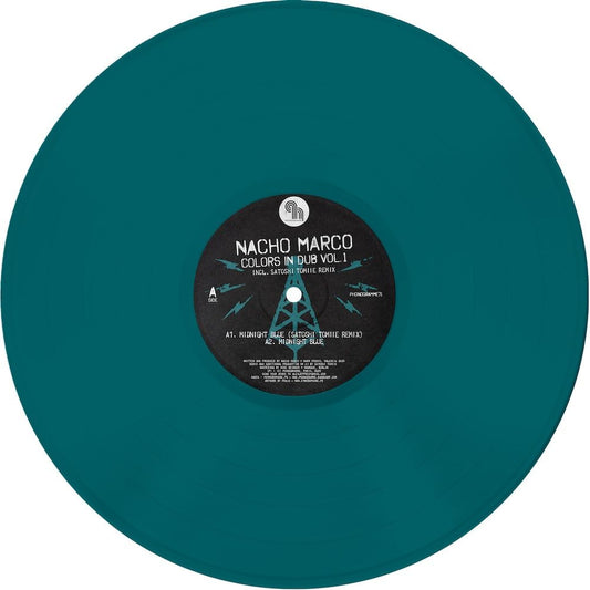 Vinyl record titled "Colors in Dub Vol. 1" by Nacho Marco and Satoshi Tomiie, displayed on a turntable with colorful cover art.