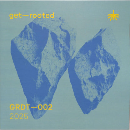 Yoyaku DJ Deep Traumér vinyl record GRDT 002 with colorful abstract artwork on the front cover.