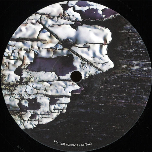 Decks Bluetrain Rolling Riddim vinyl record with colorful label artwork and black vinyl visible in a close-up shot.