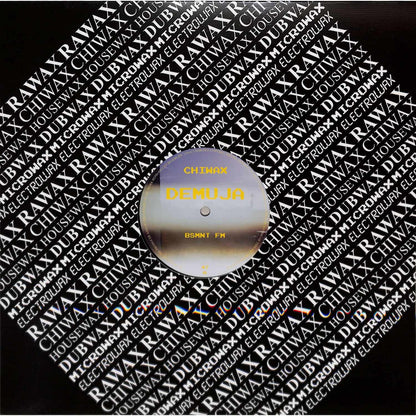 DBH DEMUJA BSMNT FM vinyl record with colorful abstract album cover artwork.