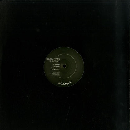 Syncrophone vinyl record of TOLGA FIDAN & SHONKY – EP, featuring the front cover with vibrant artwork and record label details.