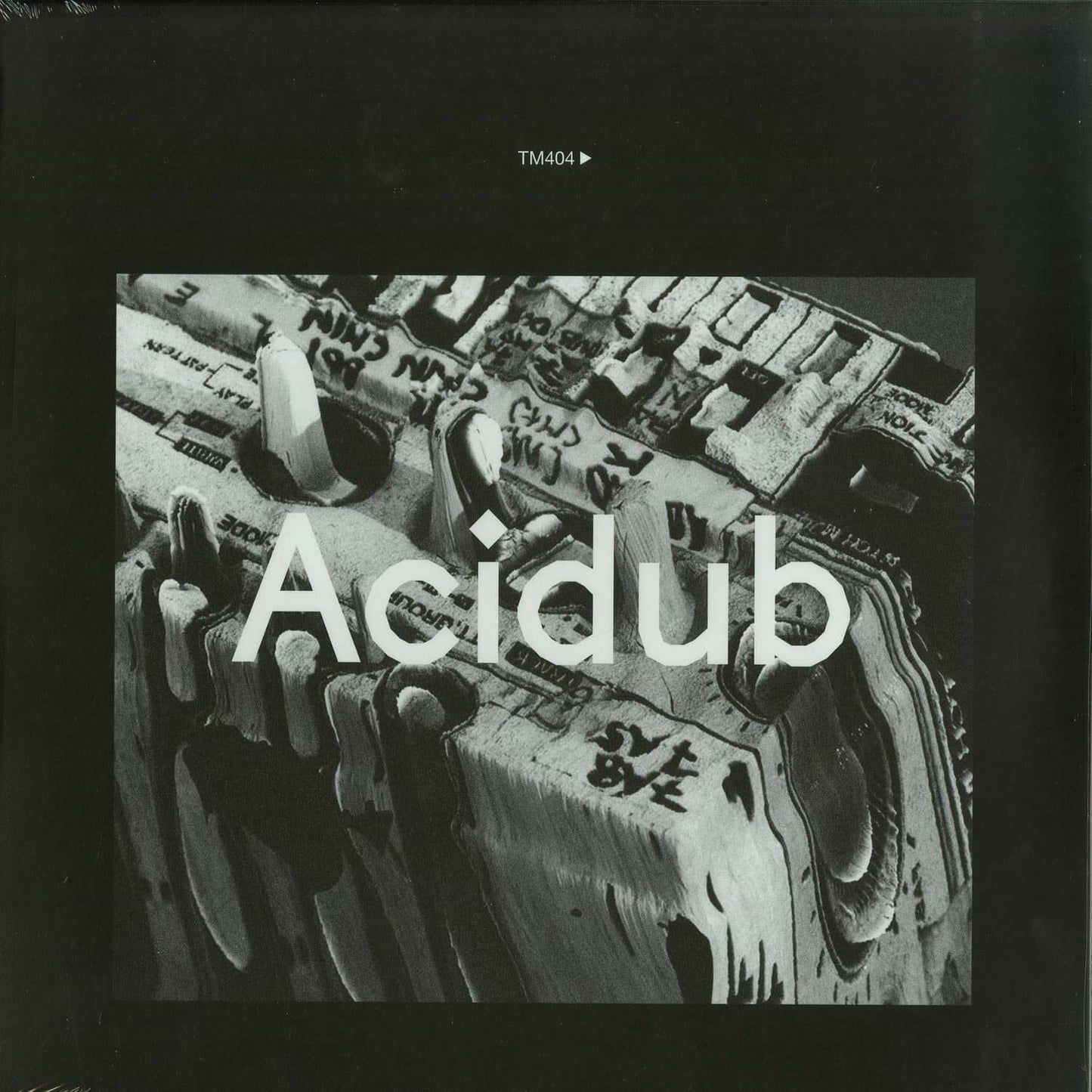 Second Hand TM404 Acidub vinyl record with colorful label and black vinyl surface, front view showing artwork and branding.