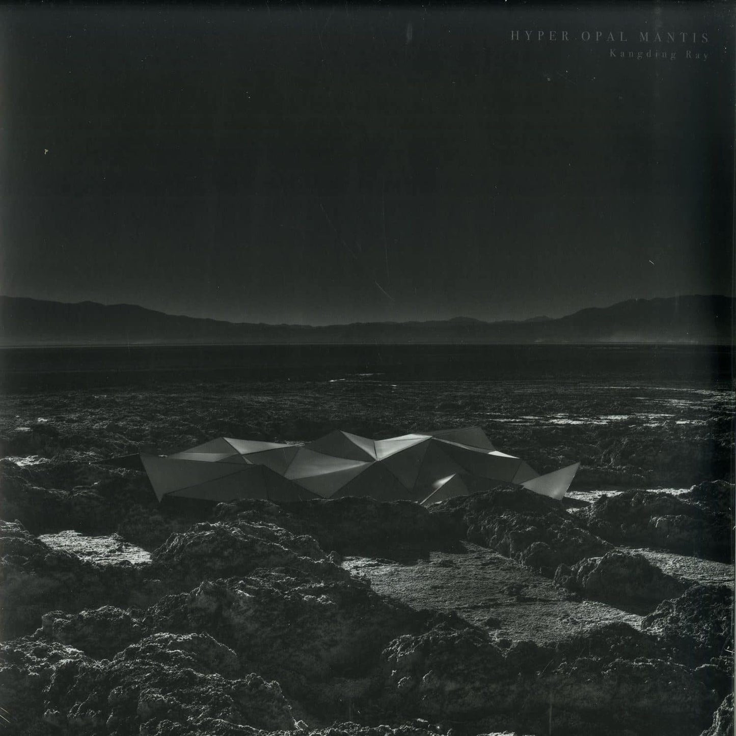 Second Hand vinyl record of KANGDING RAY – HYPER OPAL MANTIS with colorful album artwork on the front.