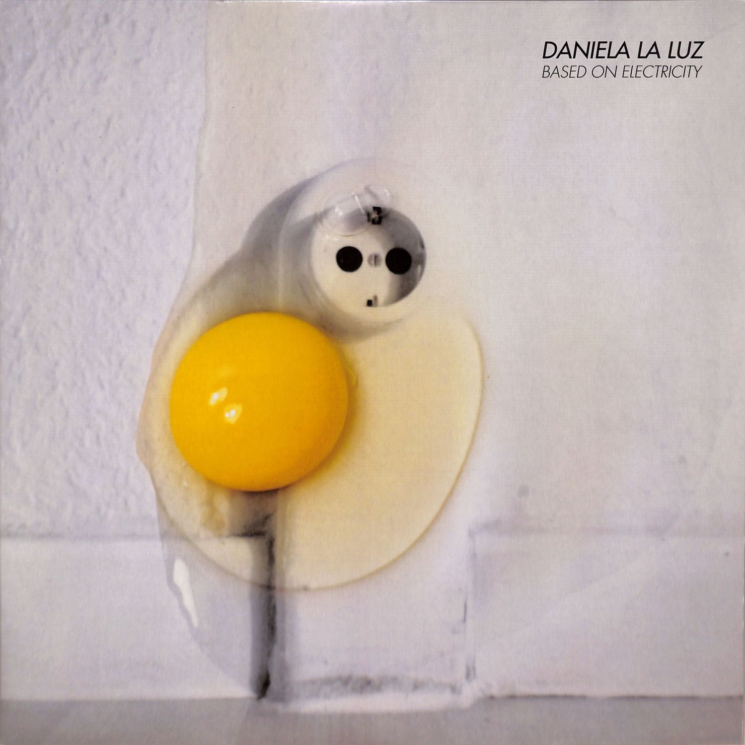 DBH vinyl record "DANIELA LA LUZ – BASED ON ELECTRICITY" with colorful album artwork featuring abstract designs.