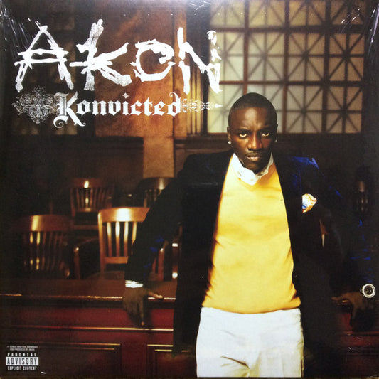 A second-hand vinyl record of AKON's KONVICTED with the front cover art showing featuring AKON and bold text.