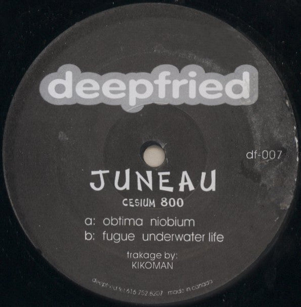 Second Hand JUNEAU Cesium 800 vinyl record with colorful album cover art featuring abstract design and bold typography.