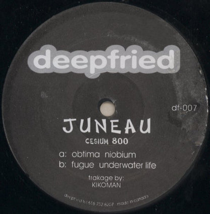 Second Hand JUNEAU Cesium 800 vinyl record with colorful album cover art featuring abstract design and bold typography.