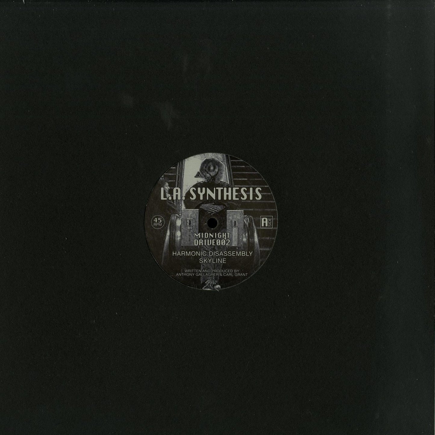 Second Hand vinyl record titled LA SYNTHESIS – HARMONIC DISASSEMBLY with colorful album artwork on the front.