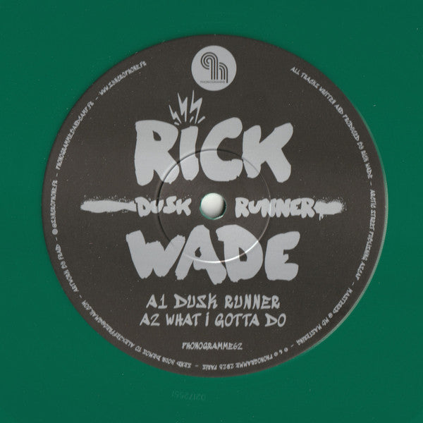 Vinyl record of Rick Wade’s Dusk Runner by Syncrophone, showing colorful abstract album artwork on the front cover.