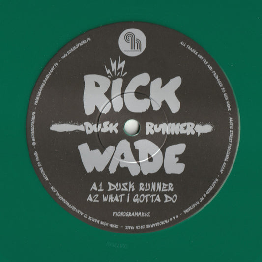 Vinyl record of Rick Wade’s Dusk Runner by Syncrophone, showing colorful abstract album artwork on the front cover.