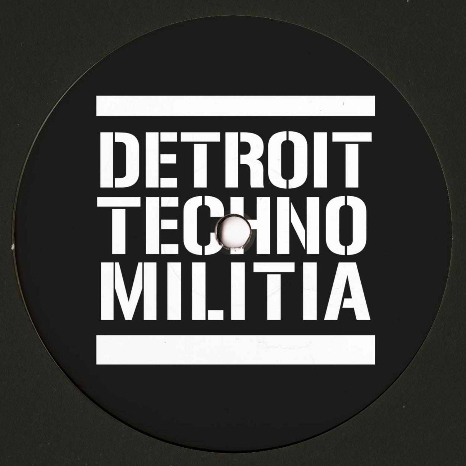 Decks J. Garcia DTM009 vinyl record with colorful album art showing on the front side.