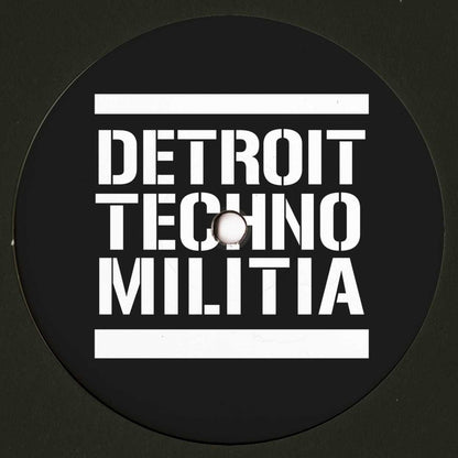 Decks J. Garcia DTM009 vinyl record with colorful album art showing on the front side.