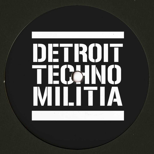 Decks J. Garcia DTM009 vinyl record with colorful album art showing on the front side.